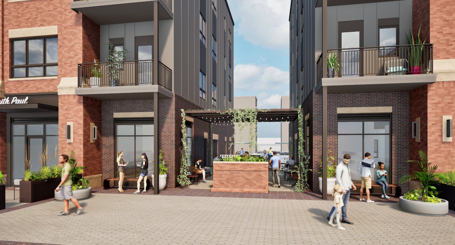 Rendering of a courtyard passage between two brick-and-metal condominium buildings, with people walking and sitting beneath a vine-covered pergola